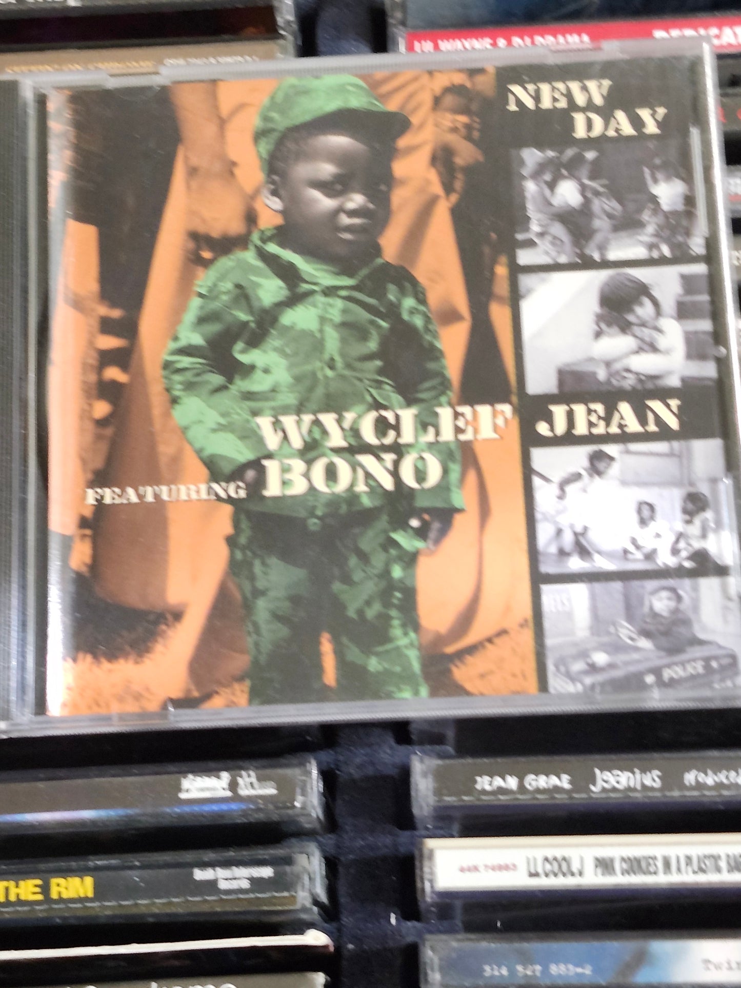 Wyclef Jean X Bono New Day CD U2