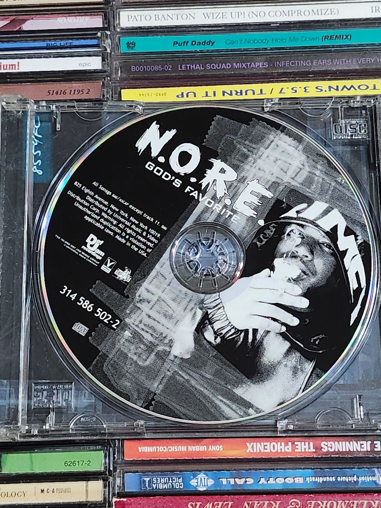 N.O.R.E. God’s Favorite CD Noreaga NORE Nelly Nas Ice-T Busta Rhymes Fat Joe